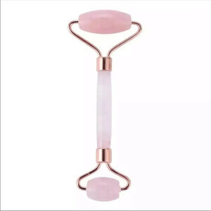 Rose quarts facial massage roller.
